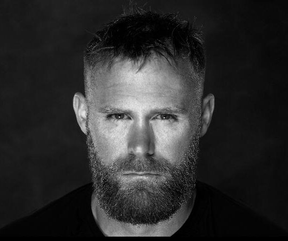 Mark Ormrod MBE profile in black and white