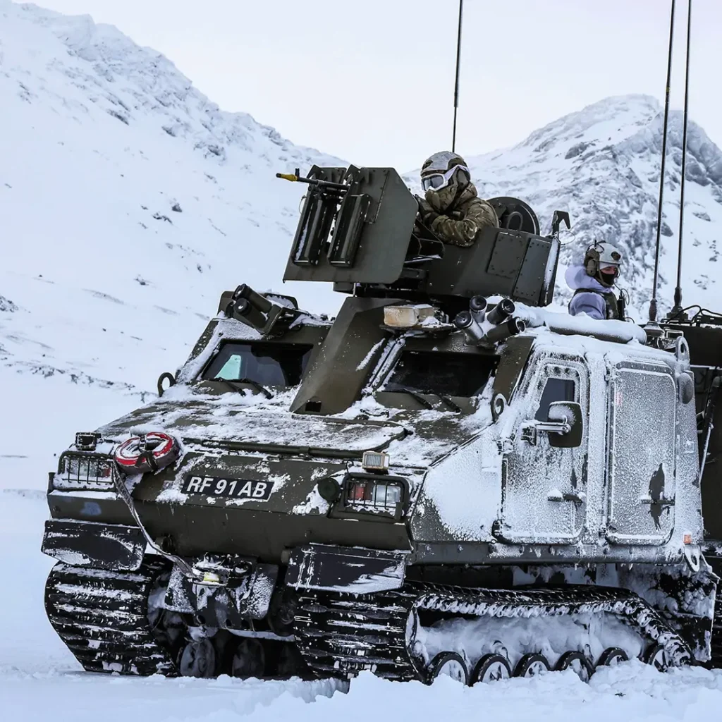 veteran in the snow on tank